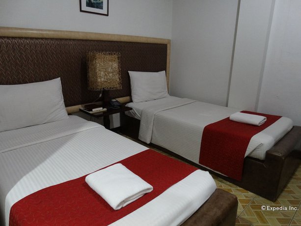 Imagen de la habitación del Hotel Ecoland Suites and Inn. Foto 17