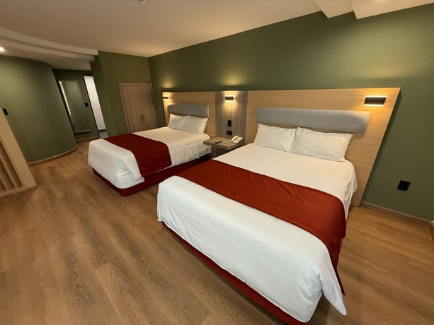 Imagen de la habitación del Hotel Econo Express Metepec. Foto 8