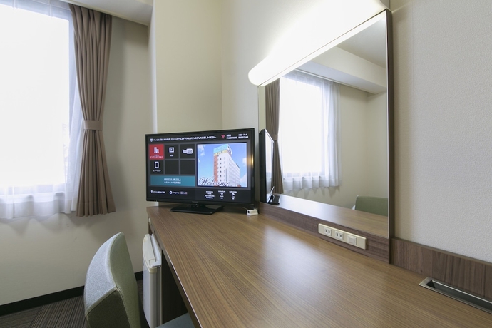 Imagen de la habitación del Hotel Econo Fukui Ekimae. Foto 13