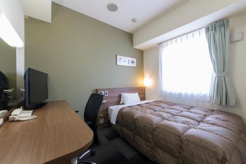 Imagen de la habitación del Hotel Econo Kameyama. Foto 4