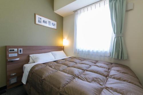 Imagen de la habitación del Hotel Econo Kameyama. Foto 6