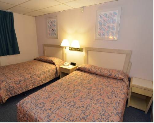 Imagen de la habitación del Hotel Econo Lodge Drums. Foto 4