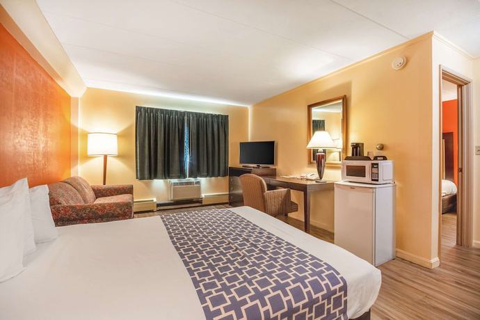 Imagen de la habitación del Hotel Econo Lodge Inn And Suites Airport. Foto 16