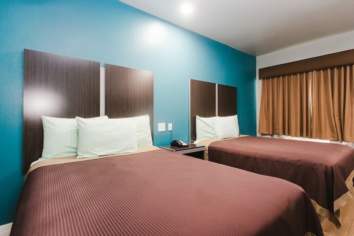 Imagen de la habitación del Hotel Econo Lodge Inn and Suites, Channelview. Foto 19