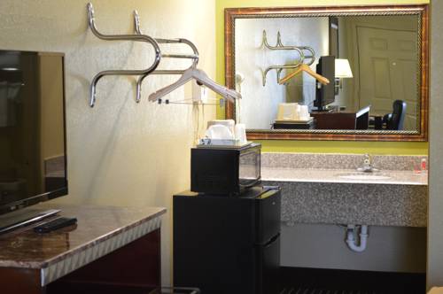 Imagen de la habitación del Hotel Econo Lodge Lake Charles University Area. Foto 5