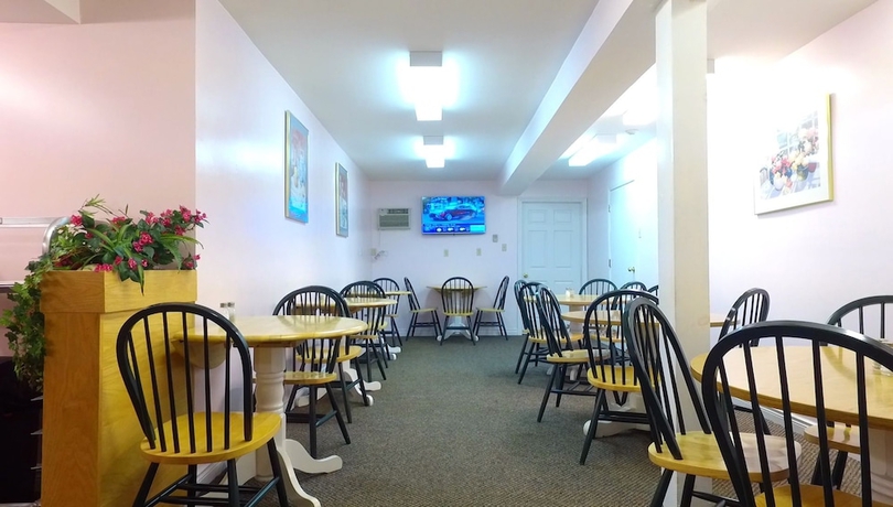 Imagen del bar/restaurante del Hotel Econo Lodge and Suites Saint John. Foto 2