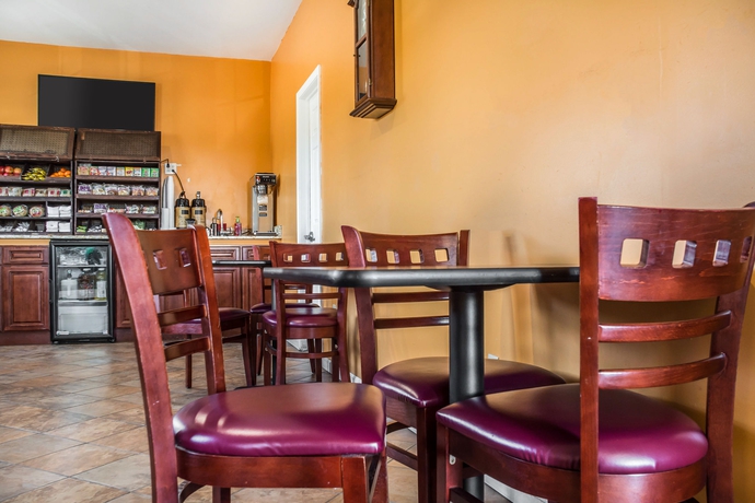 Imagen del bar/restaurante del Hotel Econo Lodge and Suites, Syracuse. Foto 6