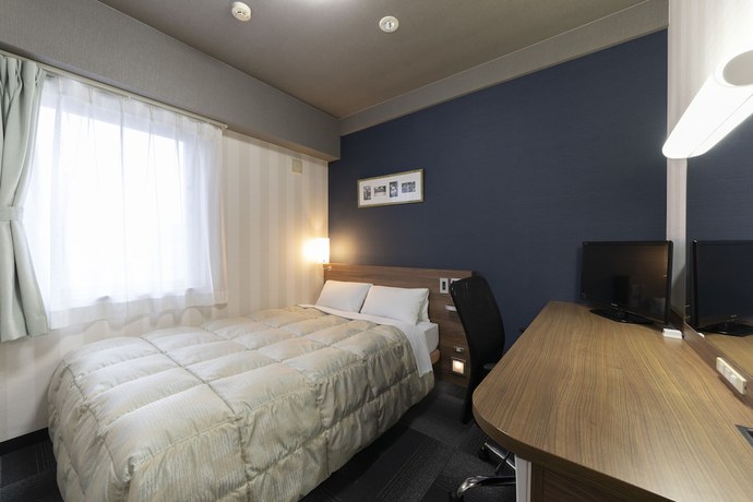 Imagen de la habitación del Hotel Econo Tsu Ekimae. Foto 7