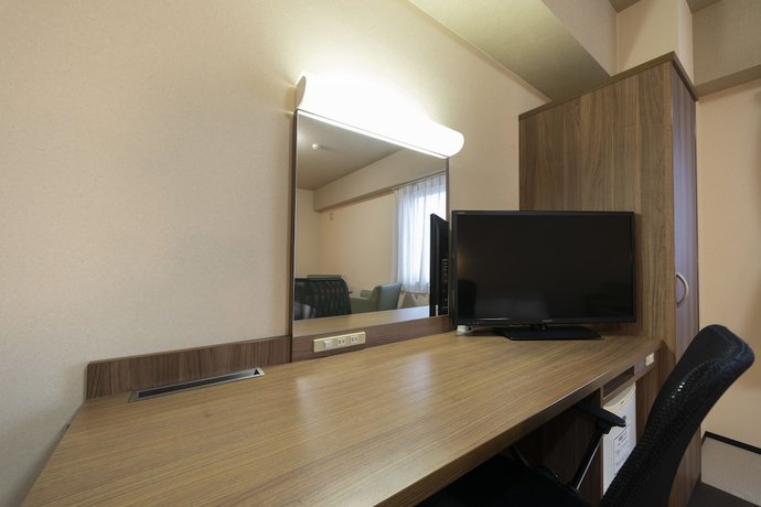 Imagen de la habitación del Hotel Econo Tsu Ekimae. Foto 11