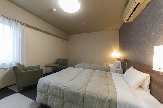 Imagen de la habitación del Hotel Econo Tsu Station. Foto 9