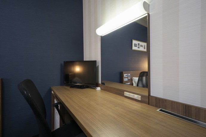 Imagen de la habitación del Hotel Econo Tsu Station. Foto 13