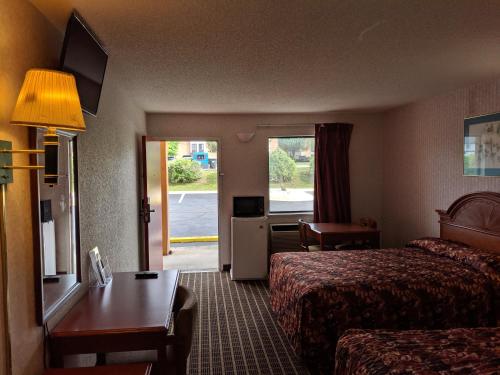 Imagen de la habitación del Hotel Economy Inn Express, Pecan Grove. Foto 5