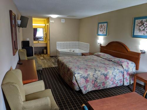 Imagen de la habitación del Hotel Economy Inn Express, Pecan Grove. Foto 6