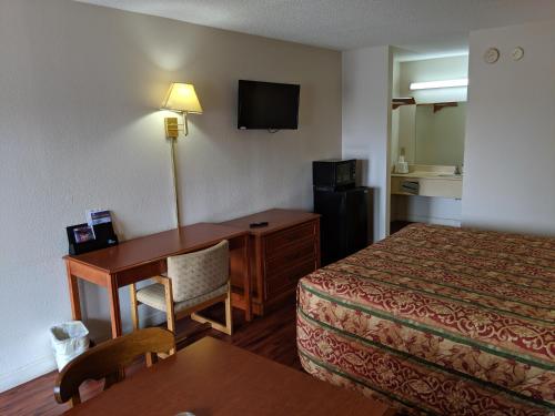 Imagen de la habitación del Hotel Economy Inn Express, Pecan Grove. Foto 7