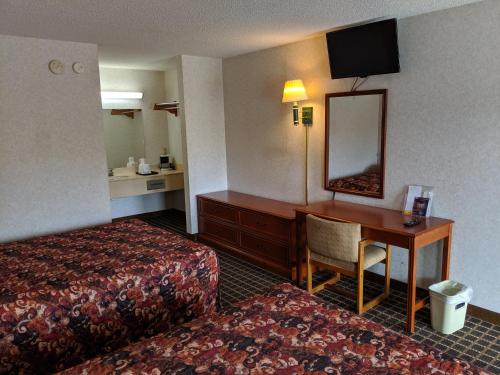 Imagen de la habitación del Hotel Economy Inn Express, Pecan Grove. Foto 8