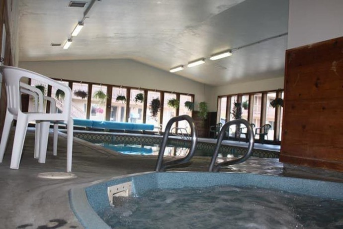 Imagen de la piscina del Hotel Economy Inn, Florence. Foto 19