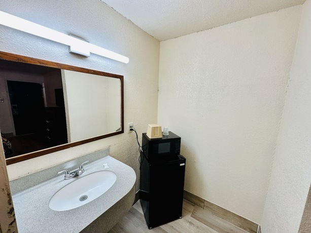 Imagen de la habitación del Hotel Economy Inn, Houma. Foto 5