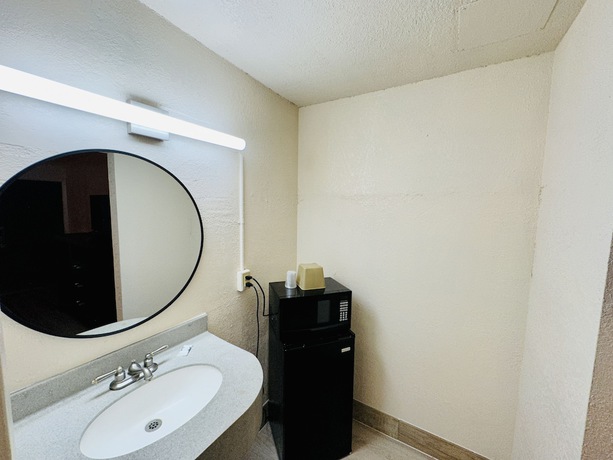 Imagen de la habitación del Hotel Economy Inn, Houma. Foto 15