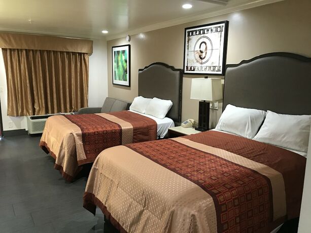 Imagen de la habitación del Hotel Economy Inn LAX. Foto 13