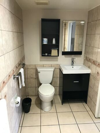 Imagen de la habitación del Hotel Economy Inn LAX. Foto 16