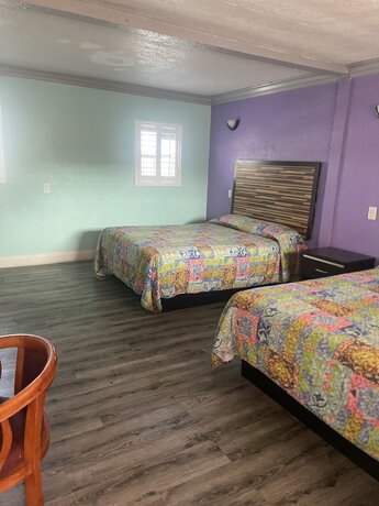 Imagen de la habitación del Hotel Economy Inn, Lynwood. Foto 19