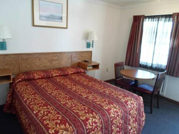 Imagen de la habitación del Hotel Economy Inn Morgan Hill. Foto 20