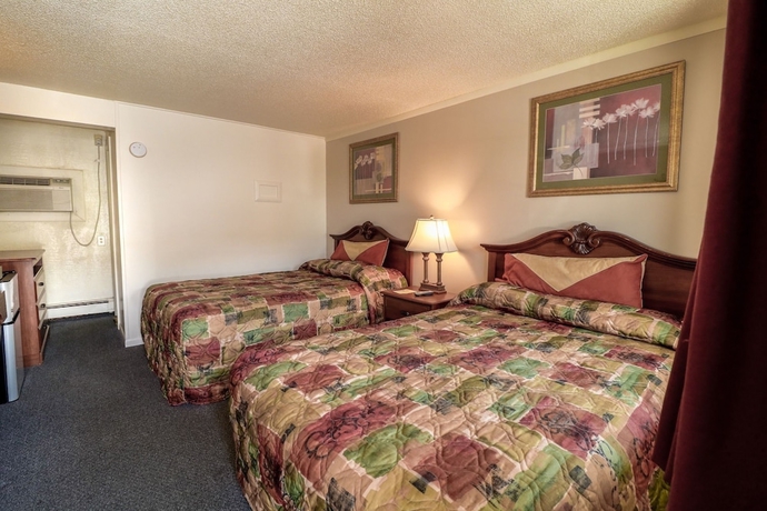 Imagen de la habitación del Hotel Economy Inn Of Bloomington. Foto 4