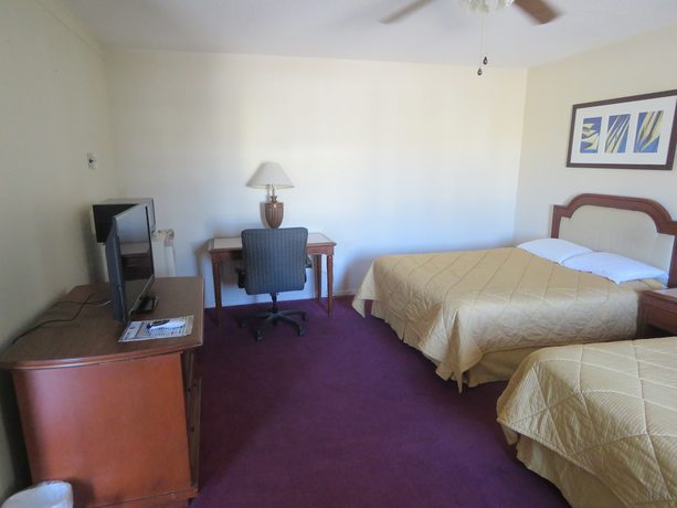 Imagen de la habitación del Hotel Economy Inn, Socorro. Foto 4