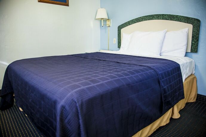 Imagen de la habitación del Hotel Economy Inn West Palm Beach. Foto 19