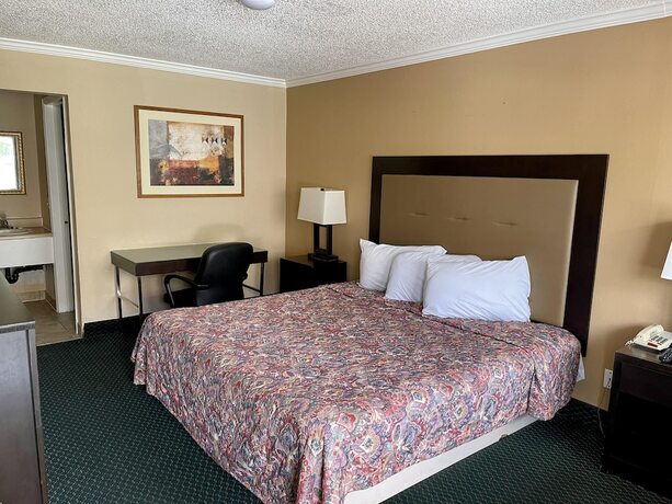 Imagen de la habitación del Hotel Economy Motel. Foto 12