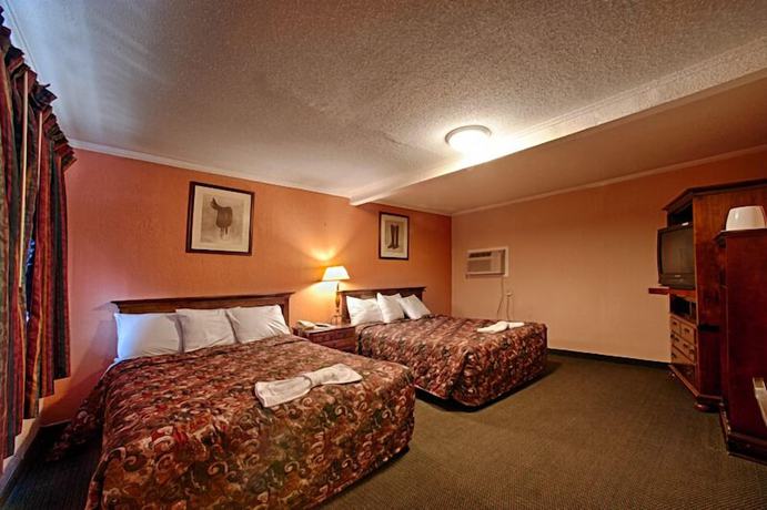 Imagen de la habitación del Hotel Economy Motel Inn and Suites. Foto 10