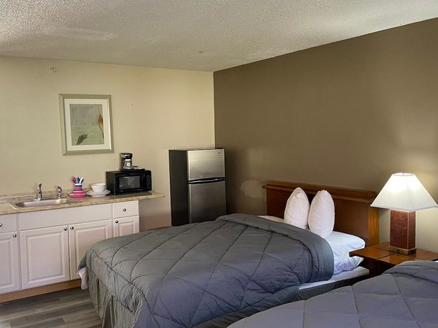 Imagen de la habitación del Hotel Economy Stay and Suites Tacoma. Foto 11