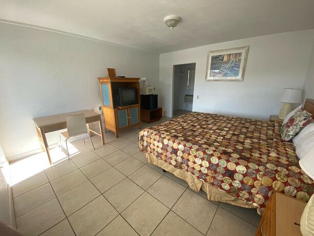 Imagen de la habitación del Hotel Economy Suites, Winter Haven. Foto 19