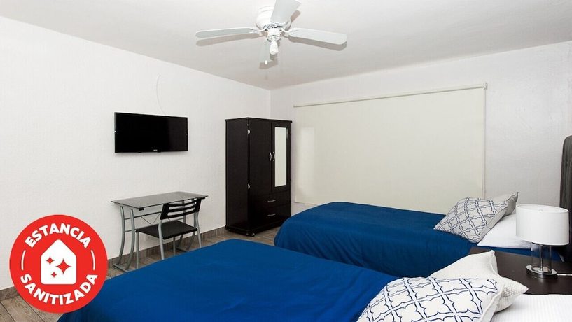 Imagen de la habitación del Hotel Econosuites Monterrey. Foto 13