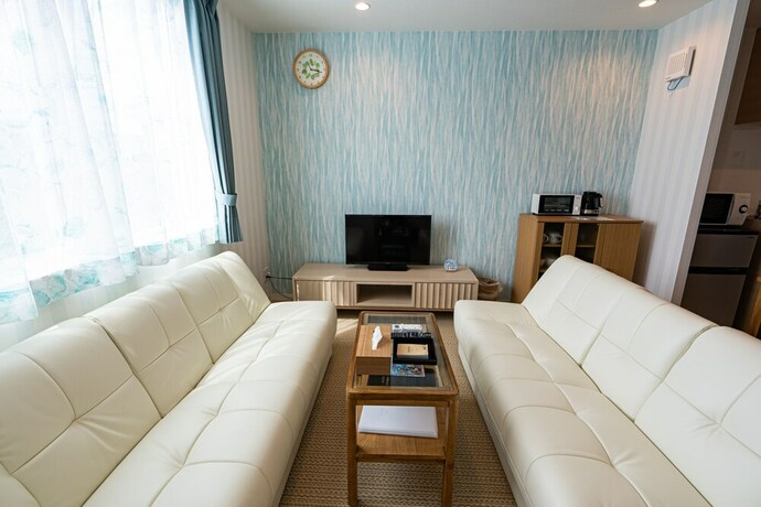 Imagen de la habitación del Hotel Ecot Irabu Bridge Sunset Hills. Foto 22