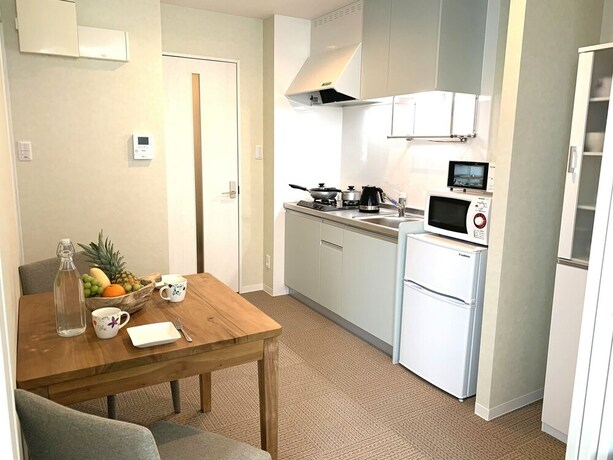 Imagen de la habitación del Hotel Ecot Shimozato 2. Foto 21