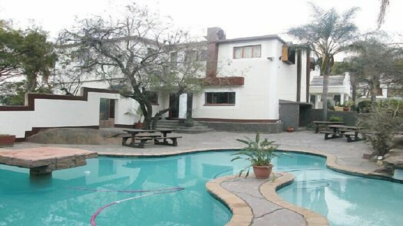 Imagen de la piscina del Hotel Ecotel Midrand. Foto 16