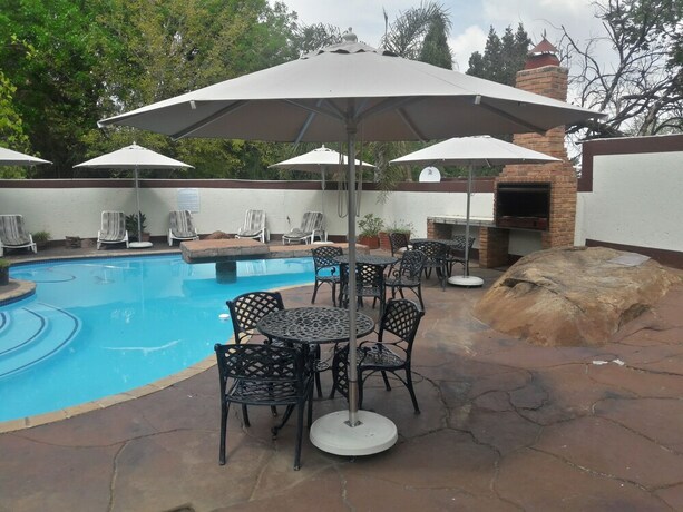 Imagen de la piscina del Hotel Ecotel Midrand. Foto 18