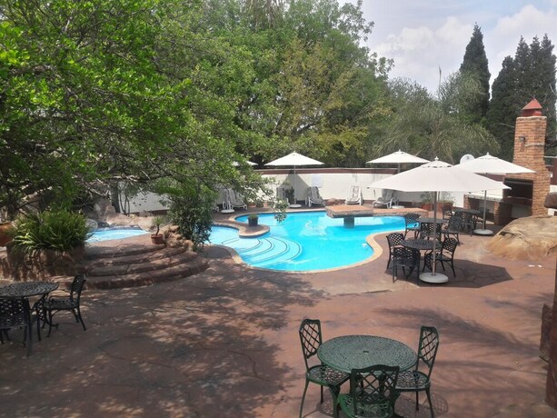 Imagen de la piscina del Hotel Ecotel Midrand. Foto 20
