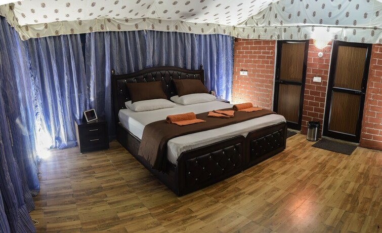 Imagen de la habitación del Hotel Ecoterra Serene Resort. Foto 9
