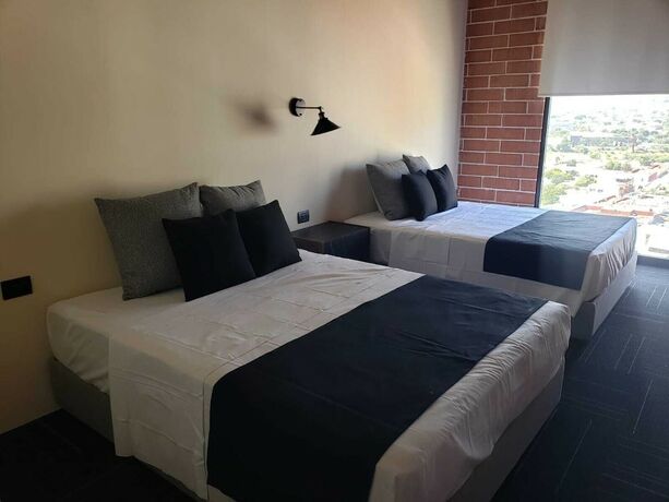 Imagen de la habitación del Hotel Ecovergel Santa Lucia. Foto 16