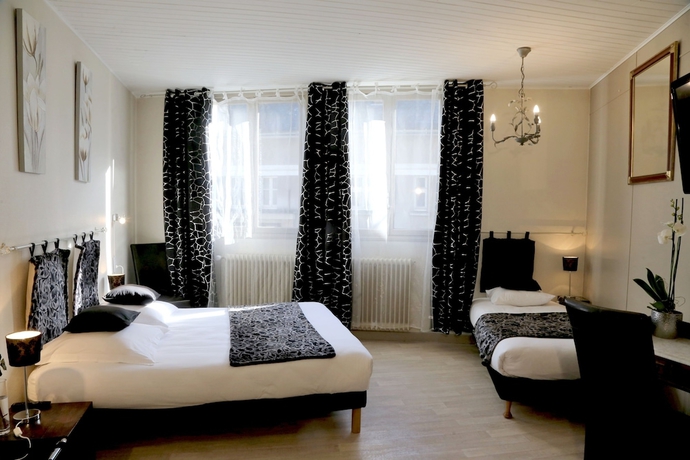 Imagen de la habitación del Hotel Ecu De France. Foto 3