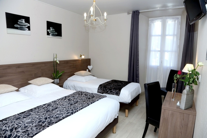 Imagen de la habitación del Hotel Ecu De France. Foto 4