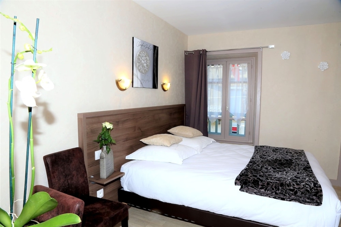 Imagen de la habitación del Hotel Ecu De France. Foto 6
