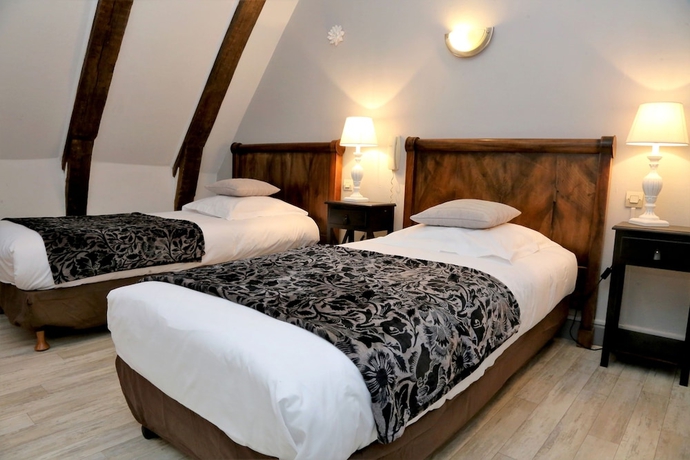 Imagen de la habitación del Hotel Ecu De France. Foto 7