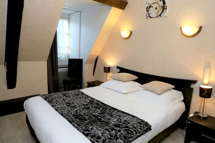 Imagen de la habitación del Hotel Ecu De France. Foto 9