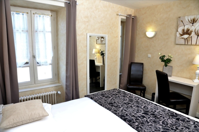 Imagen de la habitación del Hotel Ecu De France. Foto 10