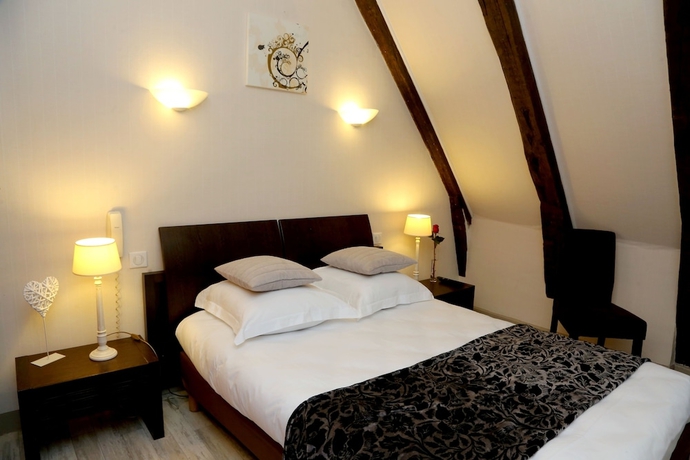 Imagen de la habitación del Hotel Ecu De France. Foto 13
