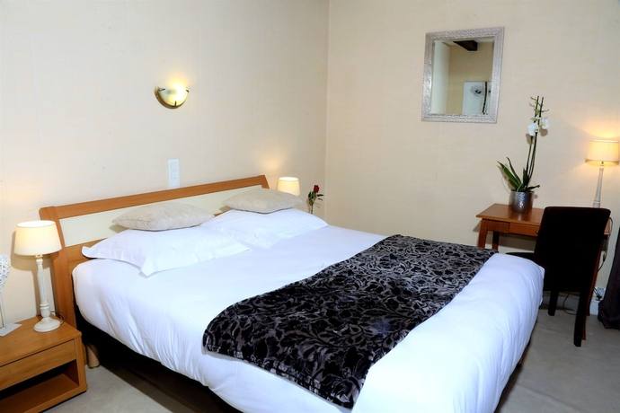 Imagen de la habitación del Hotel Ecu De France. Foto 14
