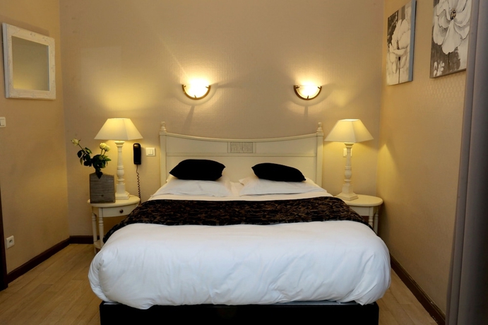 Imagen de la habitación del Hotel Ecu De France. Foto 15